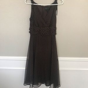 Brown with green polka dots women’s dress.